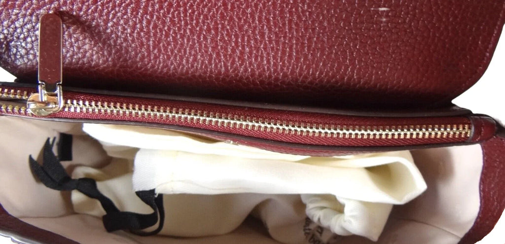 Kate Spade New York Knott Saddle Pebbled Leather Medium crossbody Bag