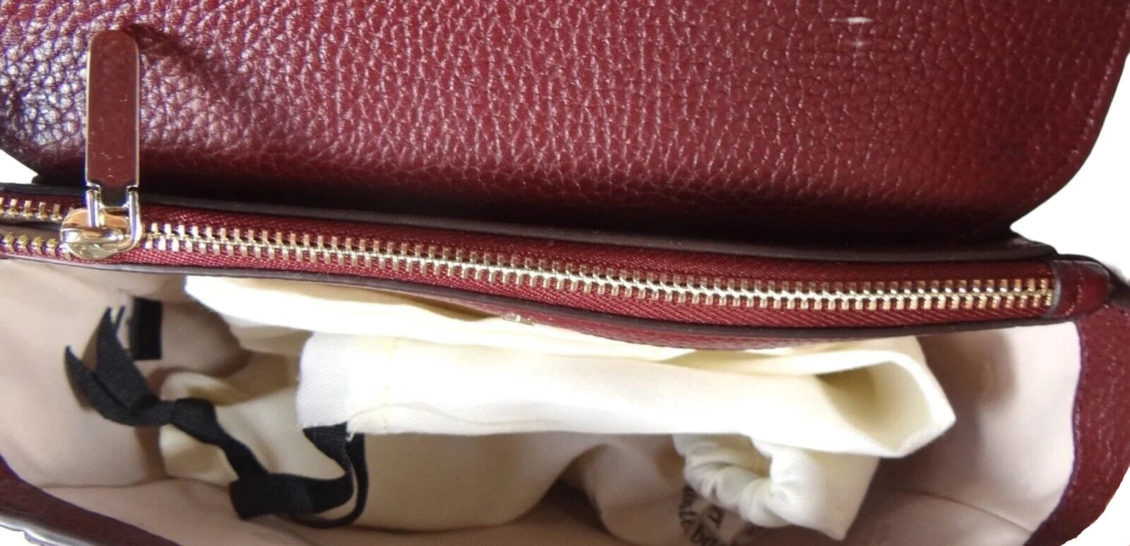 Kate Spade New York Knott Saddle Pebbled Leather Medium crossbody Bag